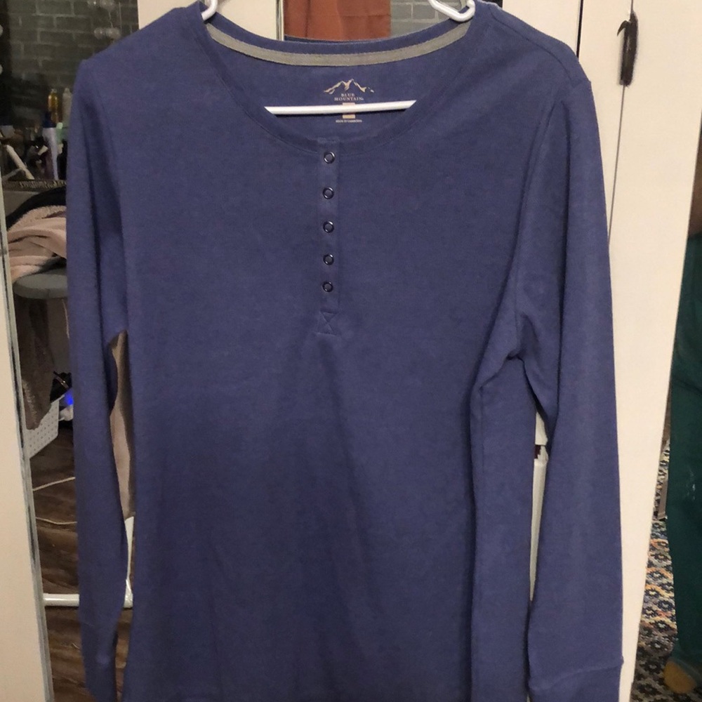 Brand new w/o tags. Blue pullover. Size Lg.